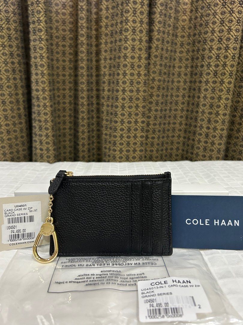 Cole Haan Zipped Leather Card Case (Category: Luxury Bags & Wallets) located in Cebu City. Submitted by huff.puff (Listing ID 1329163916, Image 2). Description: Brand new, never used. With tag ✨ 💯 Authenticity guaranteed! Pebbled leather Dimensions: 5x3 inches Retail price: 4495 Last price posted 🙏🏼 Last photo ctto for reference 🫶🏼 .