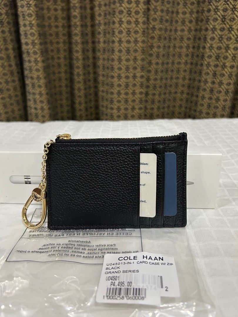 Cole Haan Zipped Leather Card Case (Category: Luxury Bags & Wallets) located in Cebu City. Submitted by huff.puff (Listing ID 1329163916, Image 3). Description: Brand new, never used. With tag ✨ 💯 Authenticity guaranteed! Pebbled leather Dimensions: 5x3 inches Retail price: 4495 Last price posted 🙏🏼 Last photo ctto for reference 🫶🏼 .