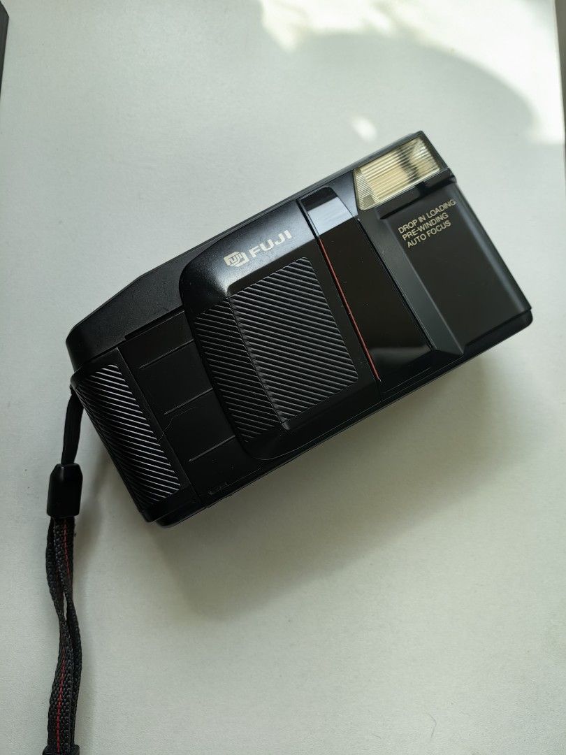 Fuji DL-300 film camera (Category: Cameras) located in Manila. Submitted by michihua (Listing ID 1329119323, Image 2). Description: Fuji Dl-300 Point & Shoot 35mm Excellent Working Condition! Film Tested (See Pictures) Comes with a Strap, CRP2 Battery, date stamp battery Cosmetics are still excellent with minimal signs of usage RFS: not using anymore, need funds.