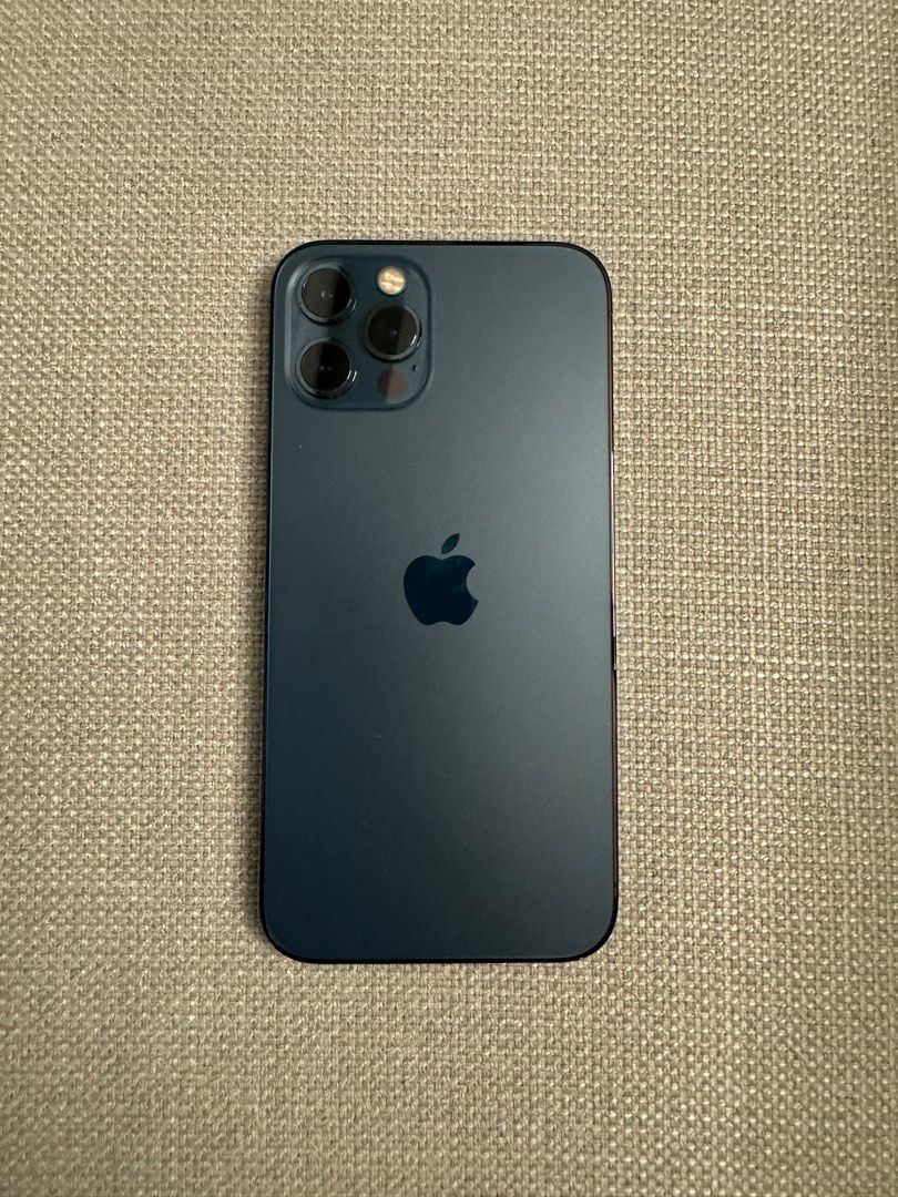 iPhone 12 Pro, Pacific Blue, 128GB + 5 Cases + 1 Pop Socket (Category: iPhone 12 Series) located in Mandaluyong City. Submitted by marshy (Listing ID 1329134499, Image 2). Description: Comes with box and pin.