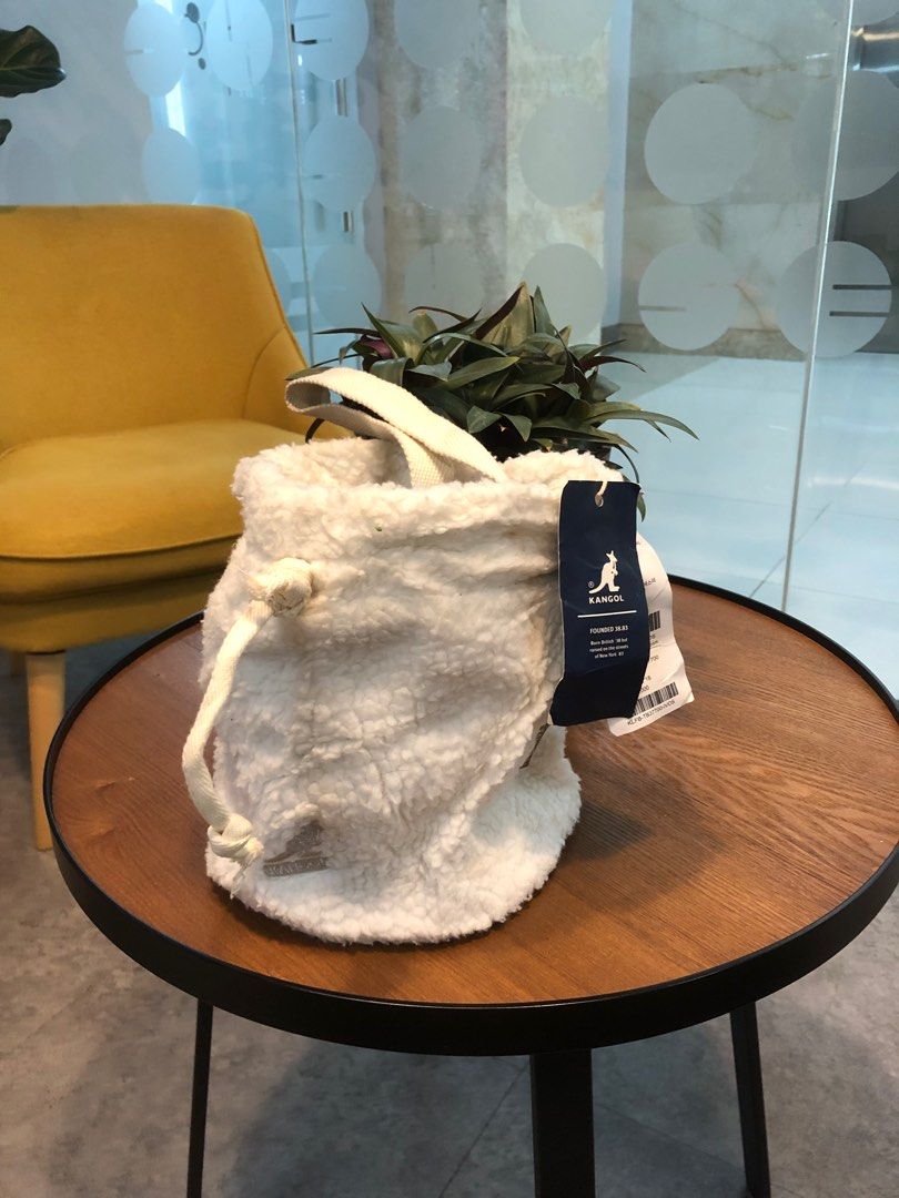 Kangol Poddle II Bucket Bag (Category: Purses & Pouches) located in Davao. Submitted by marjonhdavin (Listing ID 1329185939, Image 3). Description: Size: 24cm x 18cm x 18cm Sherpa material No issue Need wash only.