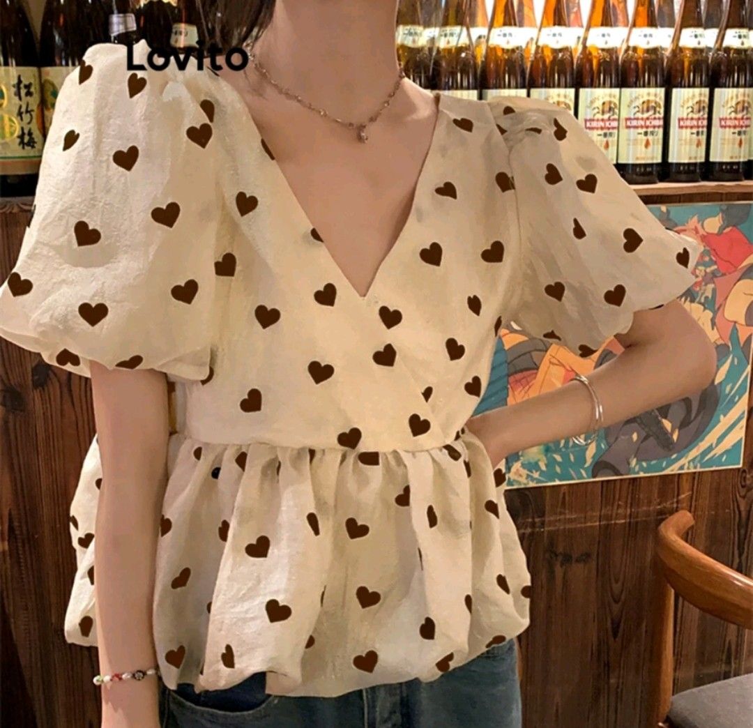 Lovito Polka dots Ruffle Puff Sleeve Blouse Top (Category: Blouses) located in Quezon City. Submitted by philpridez (Listing ID 1329206477, Image 1). Description: Bought from Lovito. Used once only Size: Small RFS: I don't wear it anymore Delivery: Buyer must shoulder the delivery fee..
