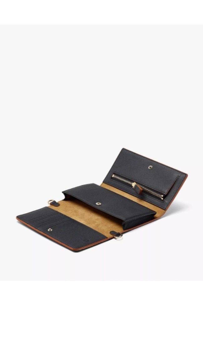 MCM cross body wallet (Category: Bags & Wallets) located in Singapore. Submitted by chillybeer (Listing ID 1329282377, Image 2). Description: will describe when free. negotiable.
