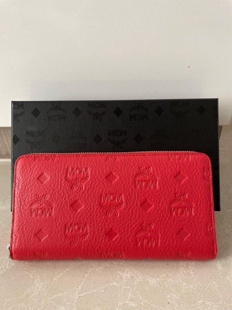 MCM Long Wallet (Category: Bags & Wallets) located in Singapore. Submitted by deschong (Listing ID 1329173752, Image 1). Description: Brand new long wallet. Lots of card slots and compartments. Size 20cm by 20.5cm.