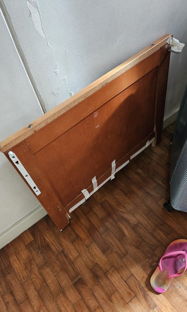 Pre-loved crib/toddler bed (Category: Cots & Cribs) located in Pasig City. Submitted by kim.es06 (Listing ID 1329109734, Image 2). Description: -Wooden crib convertible to toddler bed -has damages and needs to be repaired - available for pick-up by 3rd week of October - slightly negotiable - with mattress and free bed sheets Rfs- moving out sale.