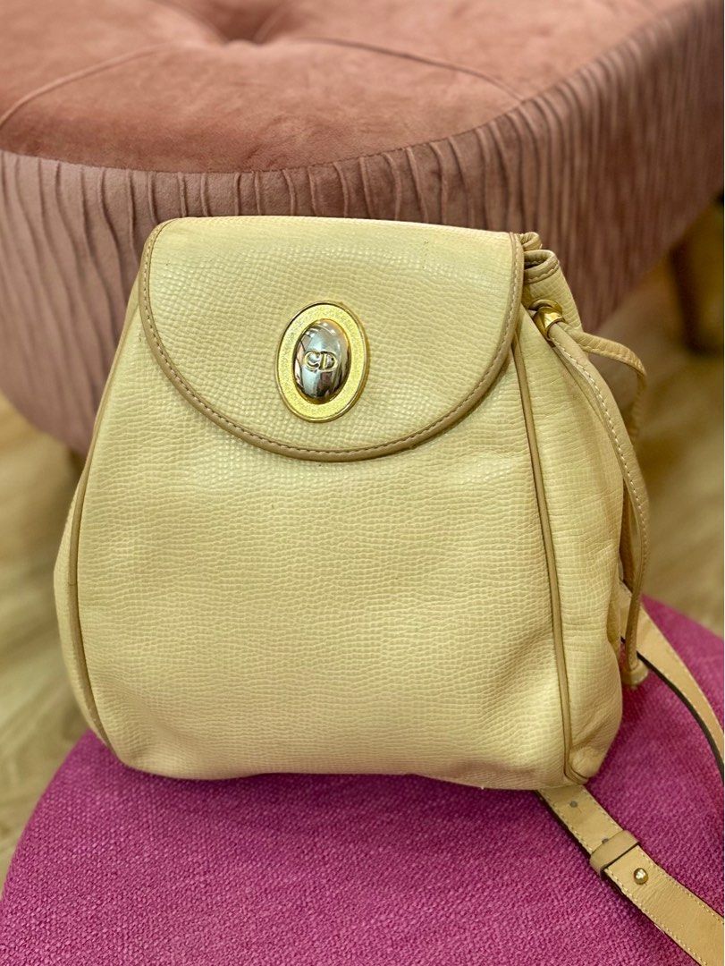 Vintage Christian Dior Backpack Yellow Leather (Category: Luxury Bags & Wallets) located in Rizal. Submitted by kimy1030 (Listing ID 1329142695, Image 1). Description: Vintage Christian Dior Yellow Leather Backpack. Gold hardware in great condition. Magnetic clasp flap closure type no flaw. .