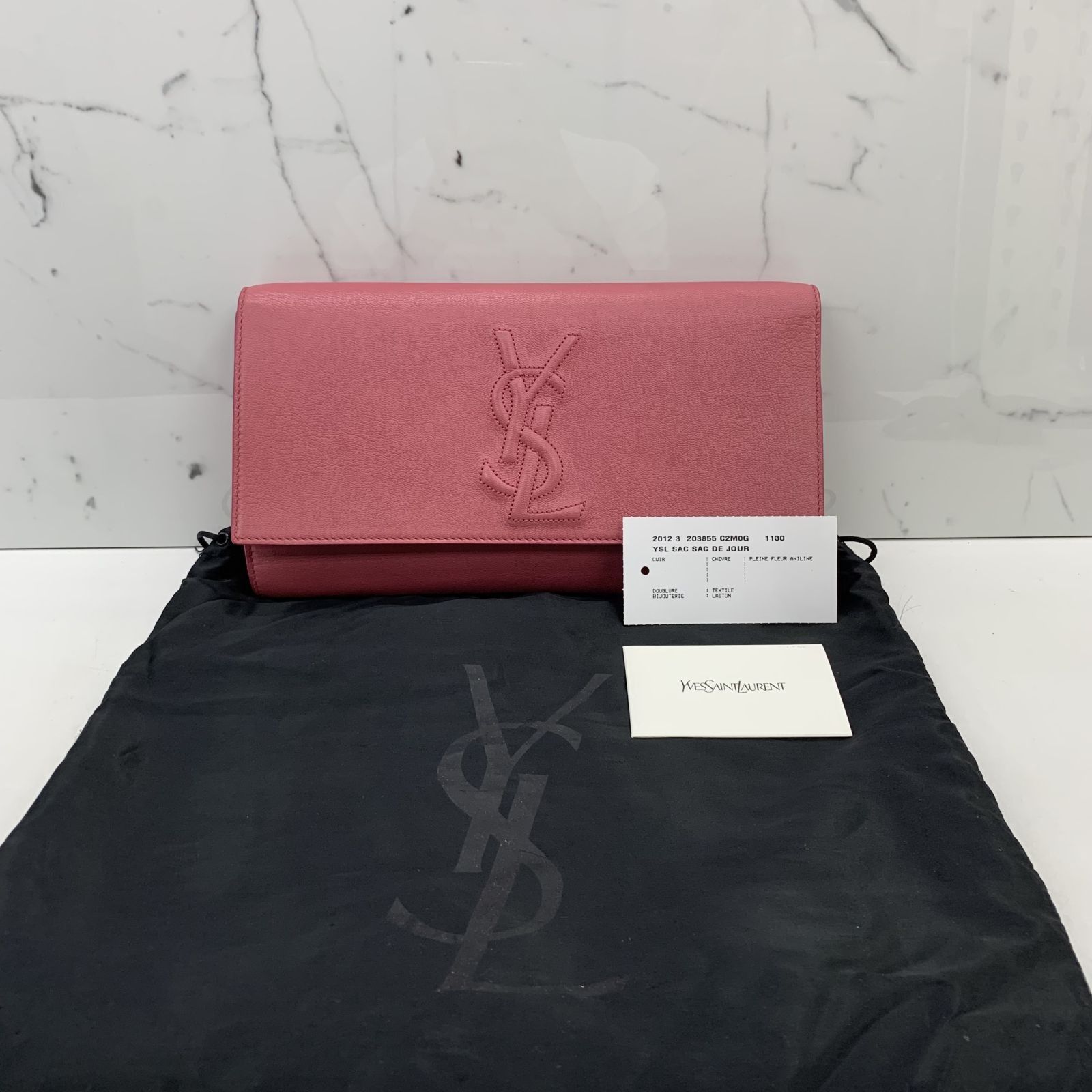 Ysl pink clutch 2025