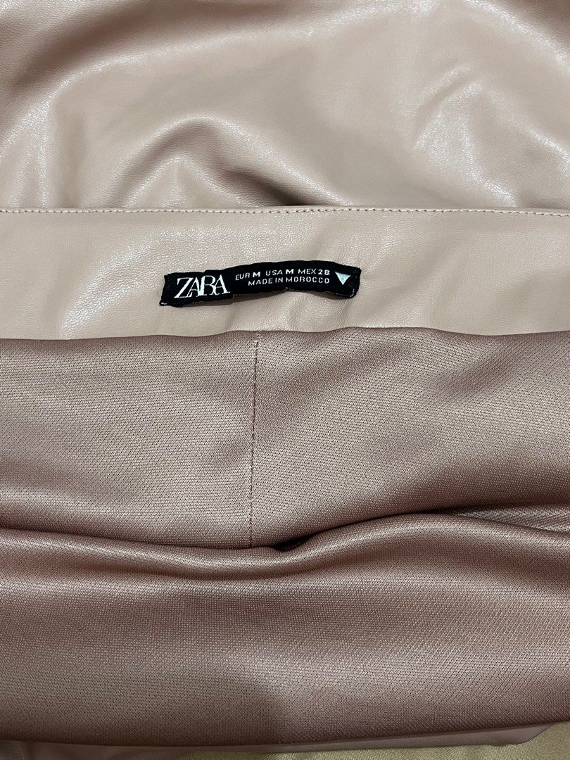 Zara Ruched Tube Top (Category: Sleeveless) located in Makati City. Submitted by declutterwitheway (Listing ID 1329158218, Image 2). Description: Bought last year at SRP 1995 for an event Selling for only 700 since this was used once and im decluttering unused clothes na. Nice leather quality and has a zipper on the side too. Would recommend this for Medium to Semi-Large frame :) .