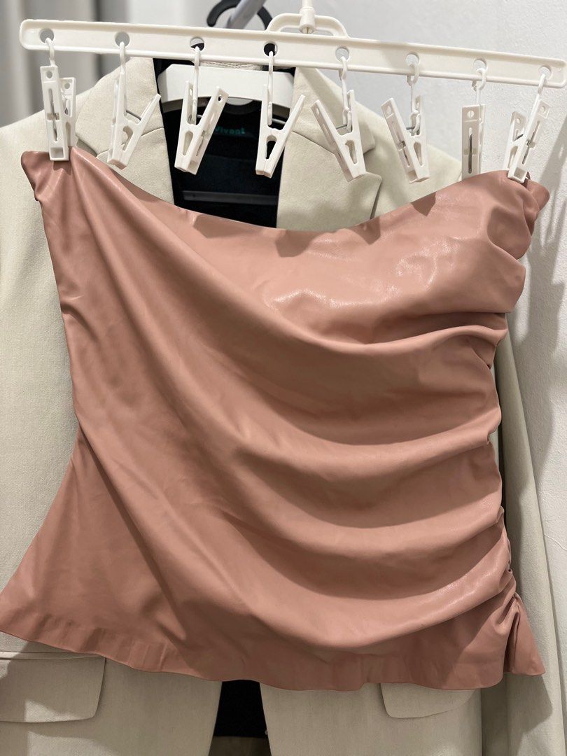 Zara Ruched Tube Top (Category: Sleeveless) located in Makati City. Submitted by declutterwitheway (Listing ID 1329158218, Image 3). Description: Bought last year at SRP 1995 for an event Selling for only 700 since this was used once and im decluttering unused clothes na. Nice leather quality and has a zipper on the side too. Would recommend this for Medium to Semi-Large frame :) .