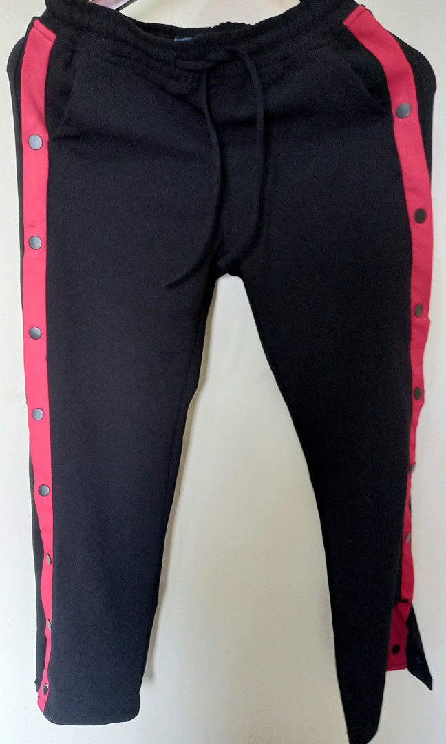 Decathlon Snap Button Track Pants (black and red) (Category: Activewear) located in Quezon City. Submitted by tinascloset_qc (Listing ID 1329325881, Image 1). Description: > open side with snap buttons > wide leg > size: small, 25-26 inch waistline > rarely used, still in good condition > brand: penshoppe > rfs: need funds, declutter.