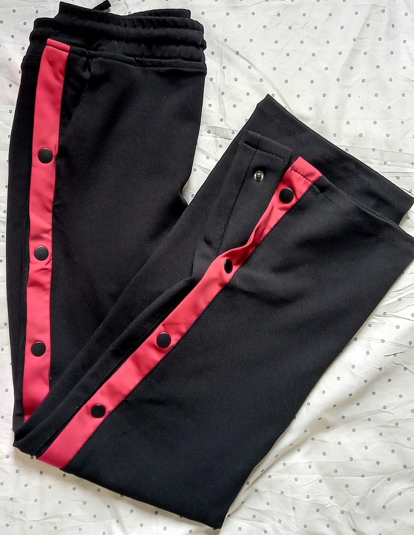 Decathlon Snap Button Track Pants (black and red) (Category: Activewear) located in Quezon City. Submitted by tinascloset_qc (Listing ID 1329325881, Image 2). Description: > open side with snap buttons > wide leg > size: small, 25-26 inch waistline > rarely used, still in good condition > brand: penshoppe > rfs: need funds, declutter.