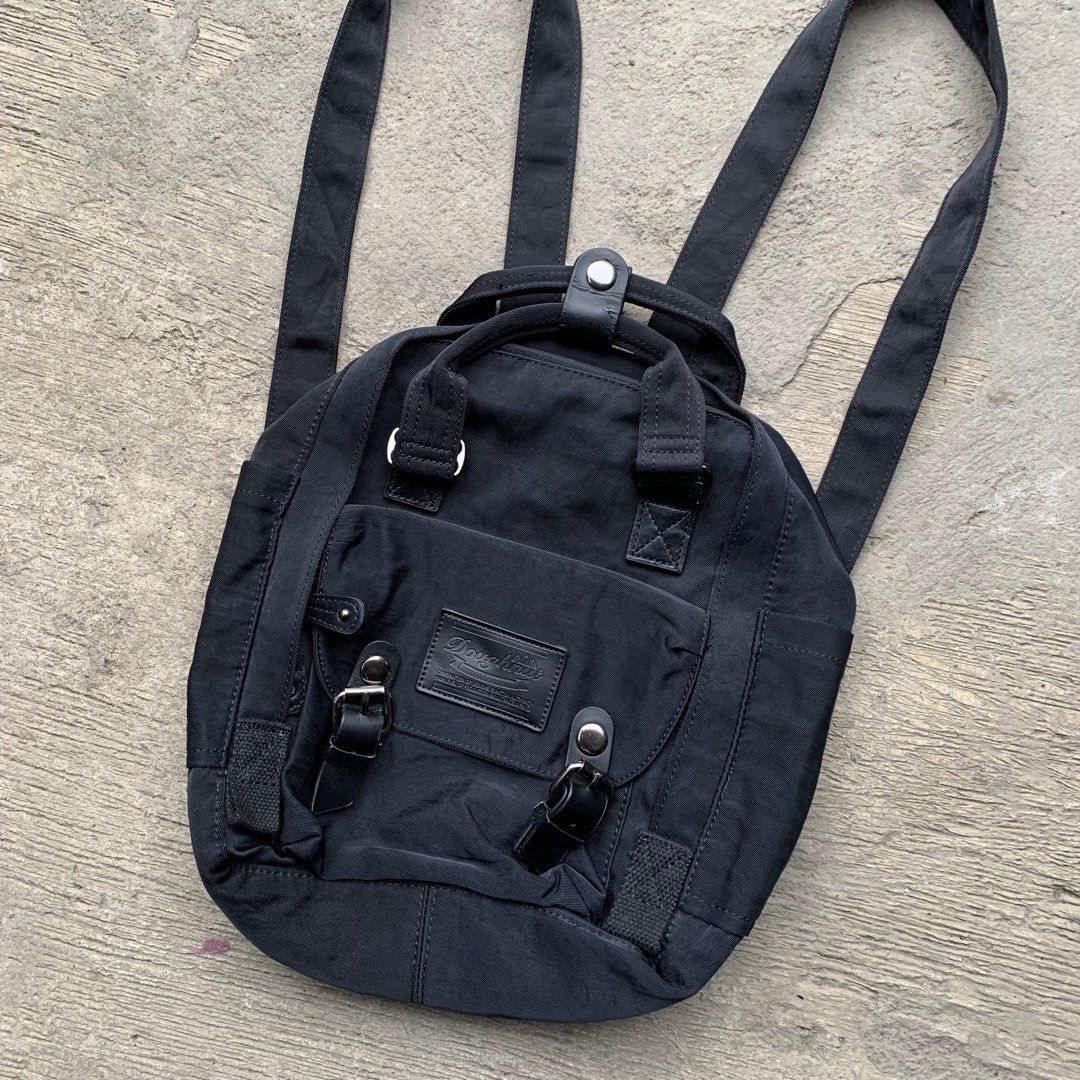 Doughnut Macaroon Mini All Black Series (Category: Backpacks) located in Manila. Submitted by fromtheflea (Listing ID 1329383265, Image 2). Description: doughnut macaroon mini all black backpack 7 liters kanken alternative; dimensions (21.5cm W x 9cm D x 30cm H) with tablet compartment; with water bottle compartment creasing on the leather buckle; washable stains in the inside 3.5k retail selling for 1200 pesos only.