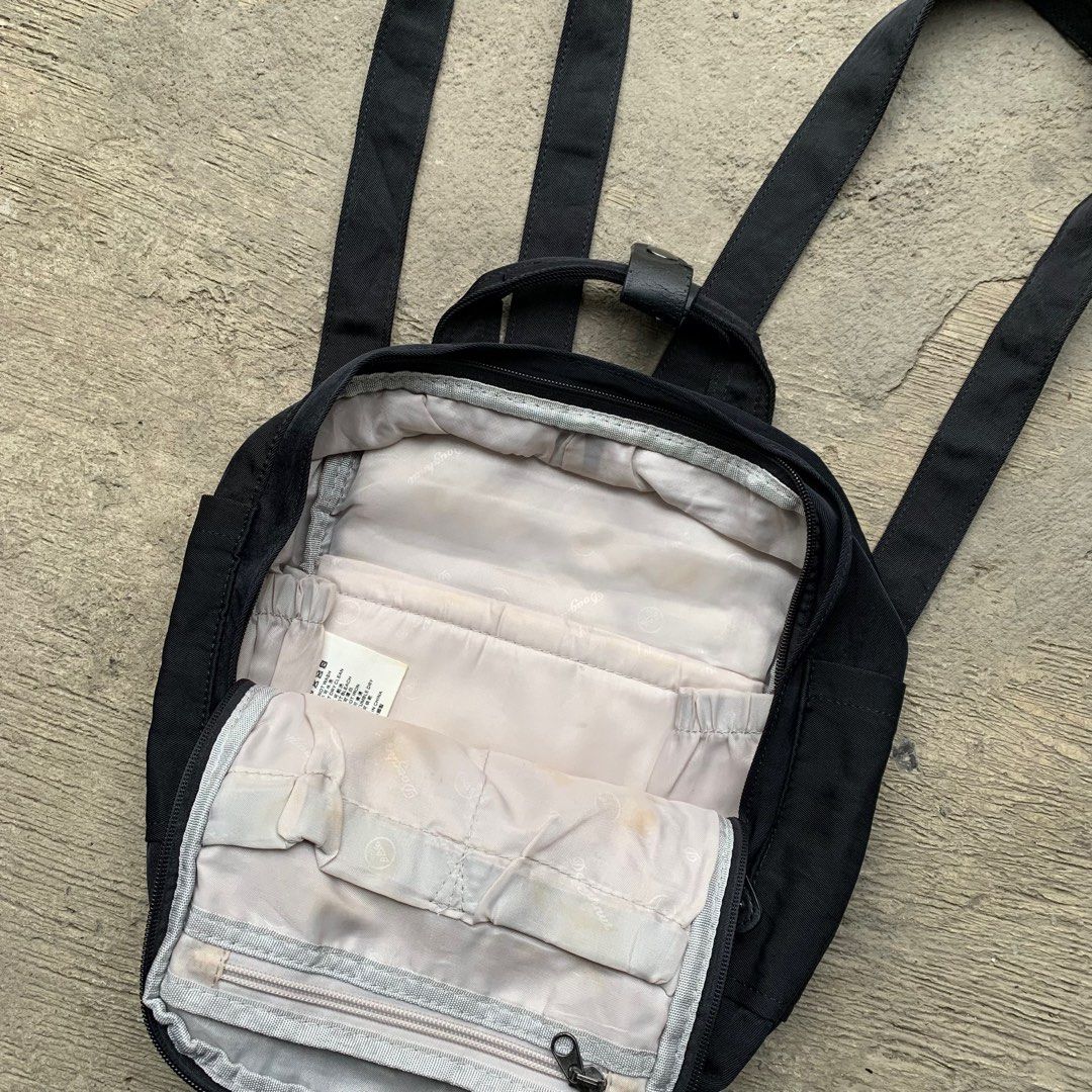 Doughnut Macaroon Mini All Black Series (Category: Backpacks) located in Manila. Submitted by fromtheflea (Listing ID 1329383265, Image 3). Description: doughnut macaroon mini all black backpack 7 liters kanken alternative; dimensions (21.5cm W x 9cm D x 30cm H) with tablet compartment; with water bottle compartment creasing on the leather buckle; washable stains in the inside 3.5k retail selling for 1200 pesos only.