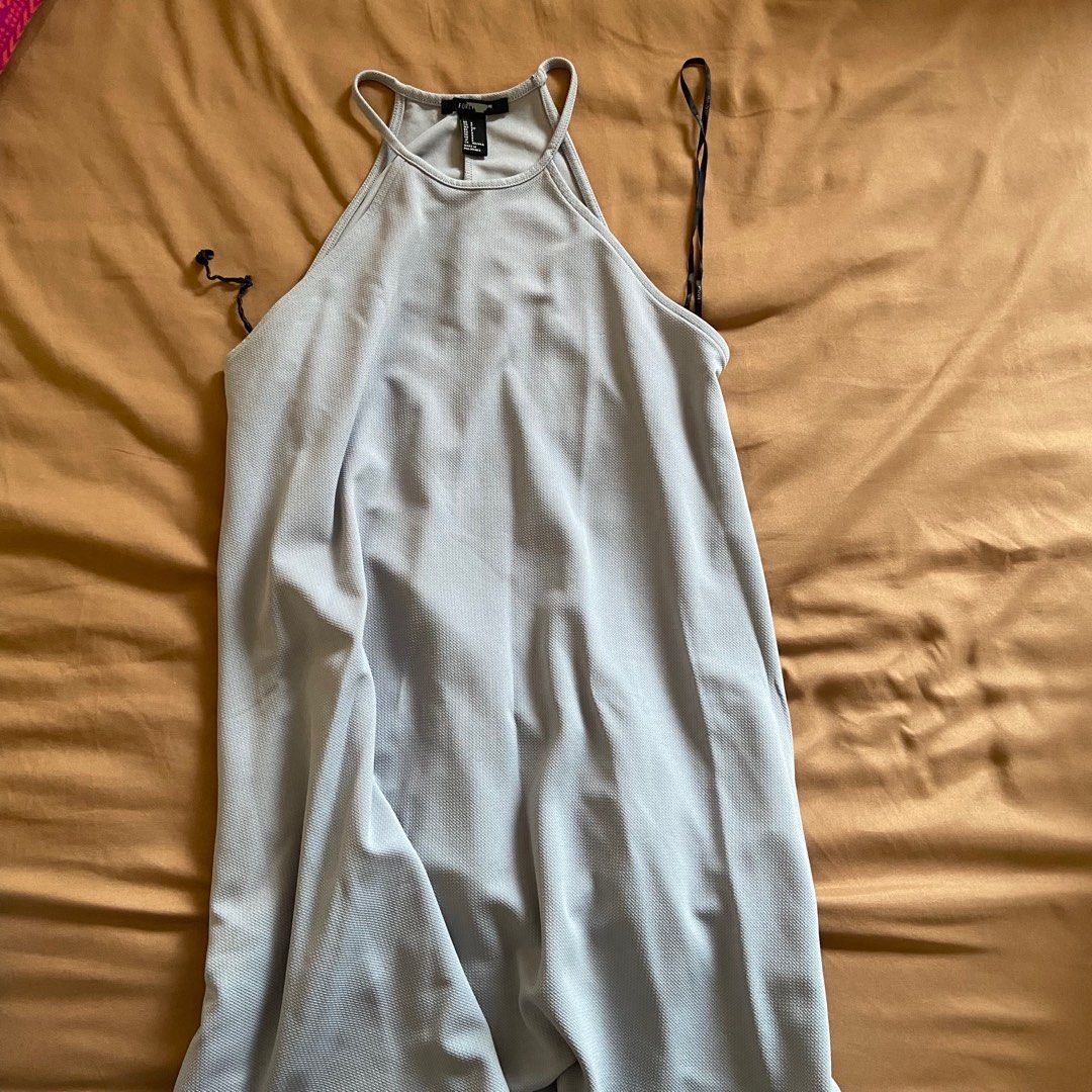 Grey Halter Dress (Category: Dresses) located in Quezon City. Submitted by cmsupreloved (Listing ID 1329325628, Image 1). Description: Flowy.