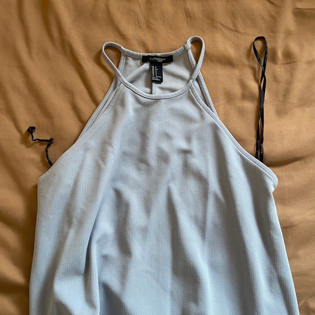 Grey Halter Dress (Category: Dresses) located in Quezon City. Submitted by cmsupreloved (Listing ID 1329325628, Image 2). Description: Flowy.