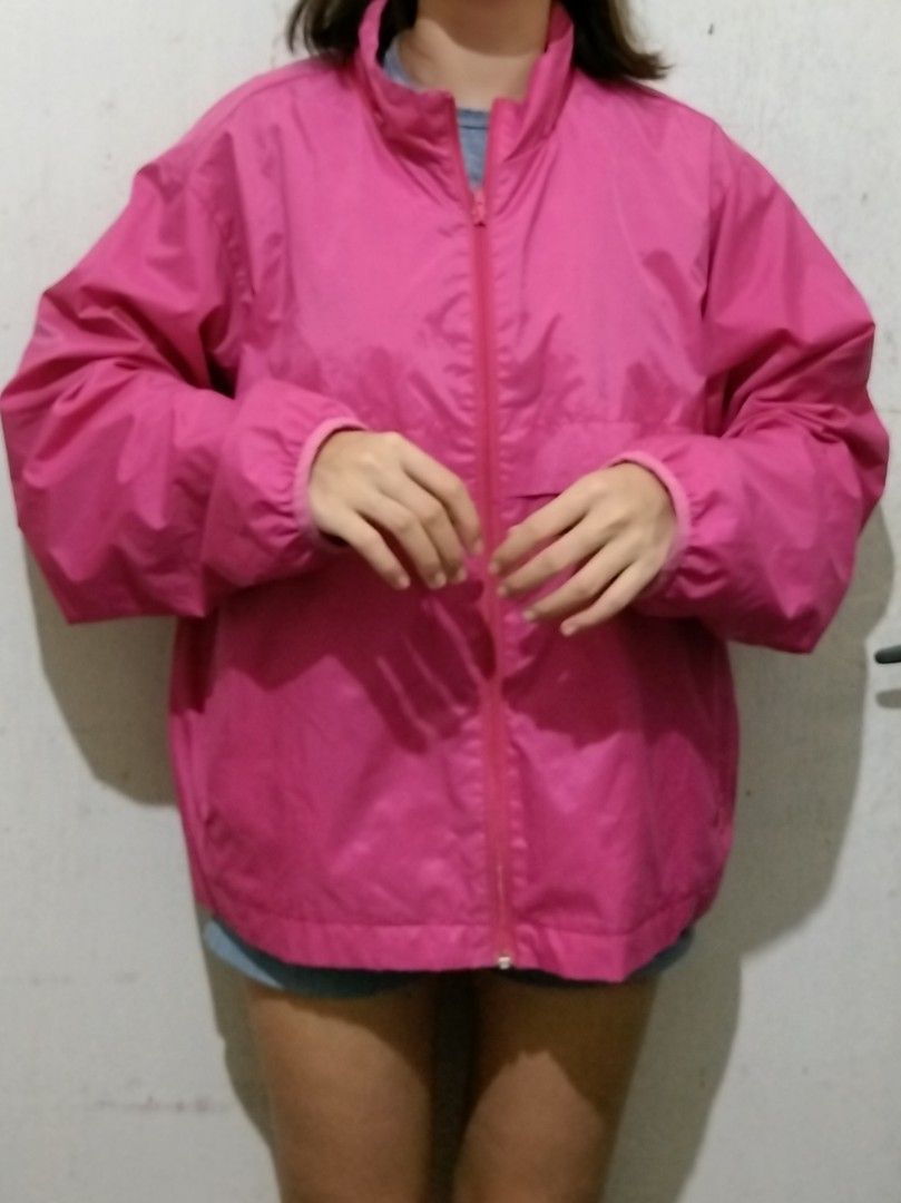 Pink windbreaker (Category: Coats, Jackets and Outerwear) located in Ilog. Submitted by ownpreloved.declutter (Listing ID 1329406781, Image 2). Description: Windbreaker Oversize for small-medium body frame XL on tag.