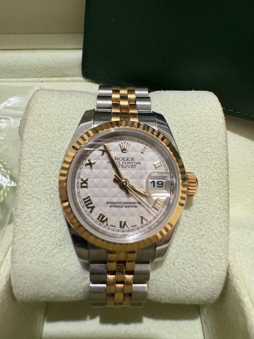 Rolex Datejust Ladies (Category: Luxury Watches) located in Del Monte. Submitted by LuxPieces (Listing ID 1329464962, Image 1). Description: Rolex Datejust Rare Pyramid Dial Ladies Size 26mm Ref. 179173 SUPER JUBILEE Pristine 9.5/10 condition Complete set Year 2011 STEAL 345k .