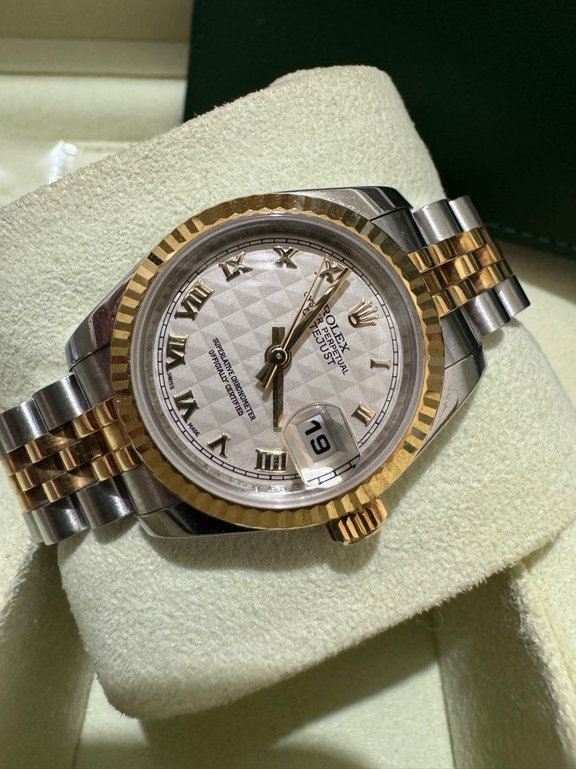 Rolex Datejust Ladies (Category: Luxury Watches) located in Del Monte. Submitted by LuxPieces (Listing ID 1329464962, Image 2). Description: Rolex Datejust Rare Pyramid Dial Ladies Size 26mm Ref. 179173 SUPER JUBILEE Pristine 9.5/10 condition Complete set Year 2011 STEAL 345k .