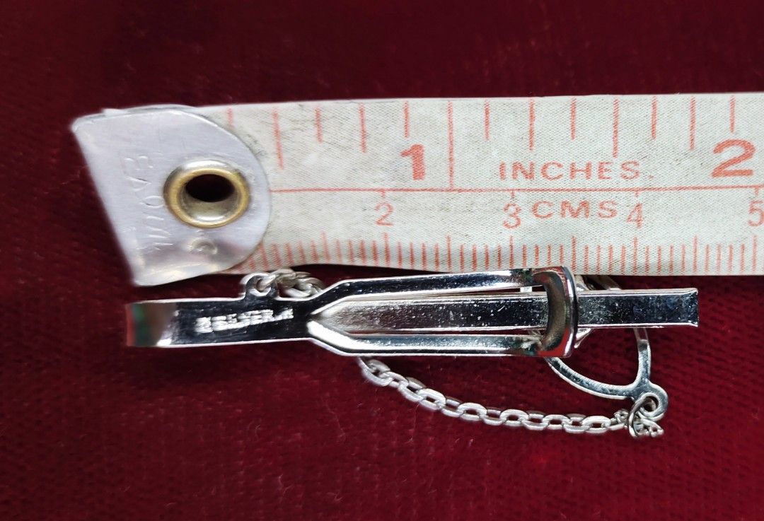 SILVER TIE CLIP WITH SILVER MARKINGS. (Category: Cuff Links) located in Pulilan. Submitted by cbssurplus (Listing ID 1329383330, Image 2). Description: SILVER TIE CLIP WITH SILVER MARKINGS FROM JAPAN.