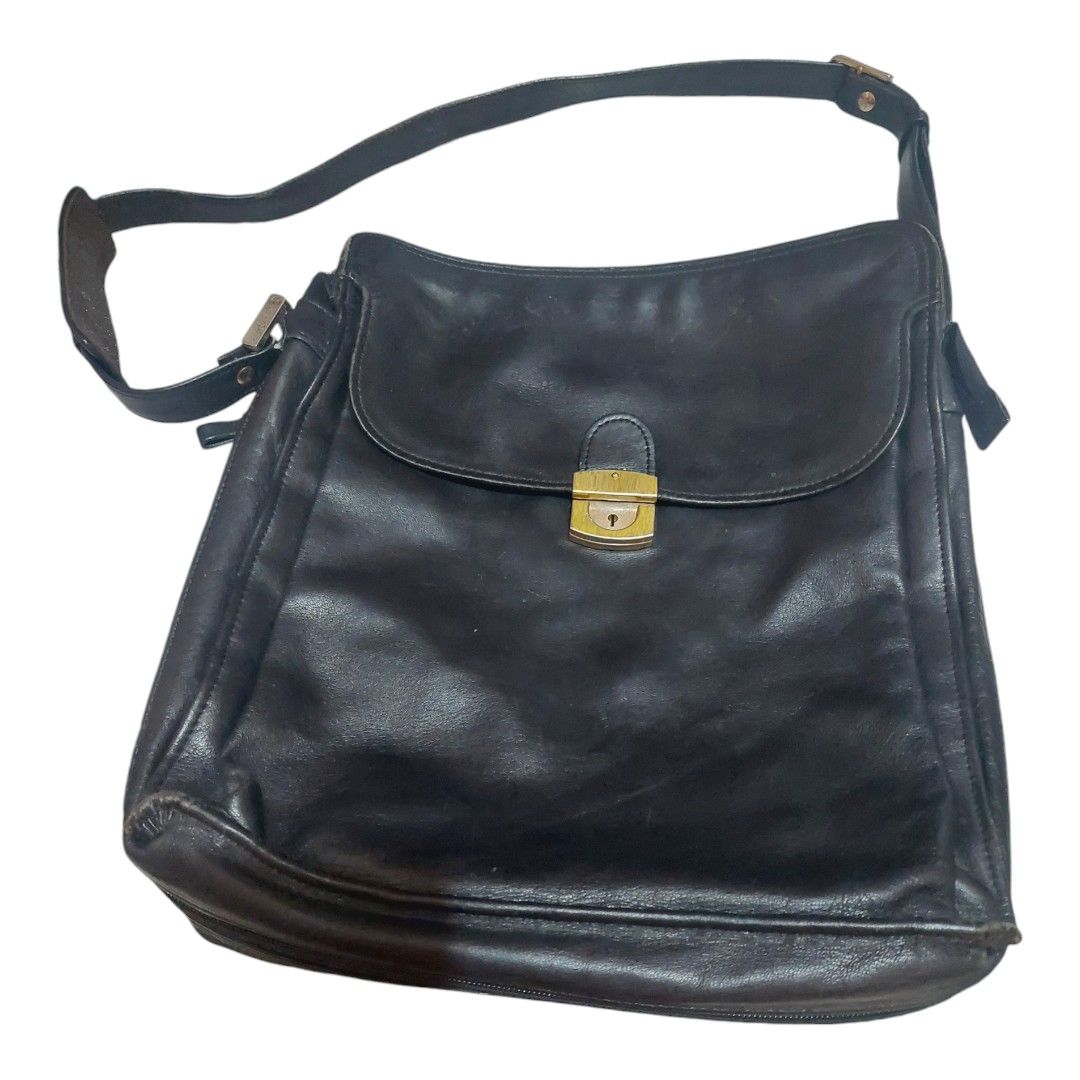 Vintage Genuine Leather Bag (Category: Luxury Bags & Wallets) located in Bulacan. Submitted by ourdailyfinds (Listing ID 1329333990, Image 1). Description: FOR SALE: Genuine Vintage Leather Messenger Bag from Japan This stylish and practical vintage leather bag is the perfect blend of functionality and timeless design. Features: High-quality leather with a unique patina that adds character Convenient front pocket for easy access with key Secure i