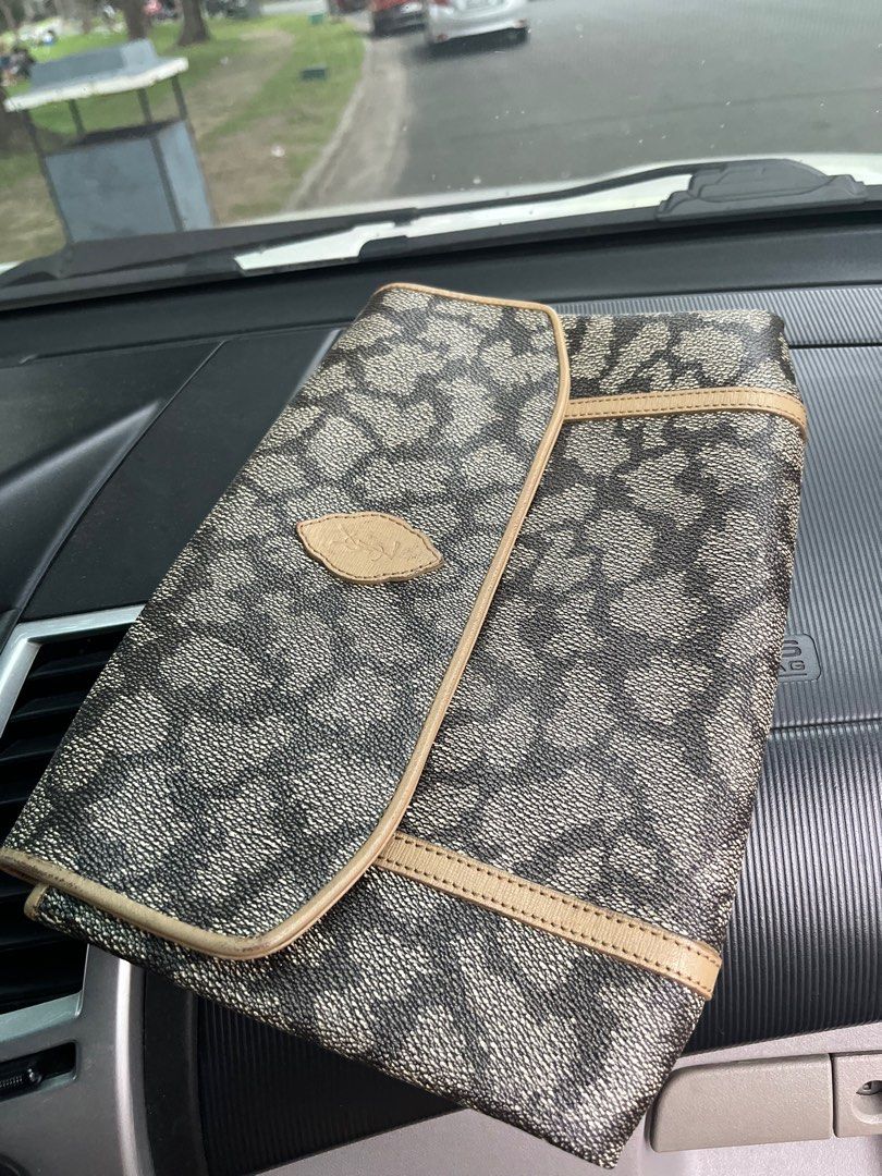 Ysl clutch (Category: Luxury Bags & Wallets) located in Manila. Submitted by dmaker_closet (Listing ID 1329365080, Image 1). Description: Ysl clutch you can make it woc Rush sale Location : villamor air base pasay.
