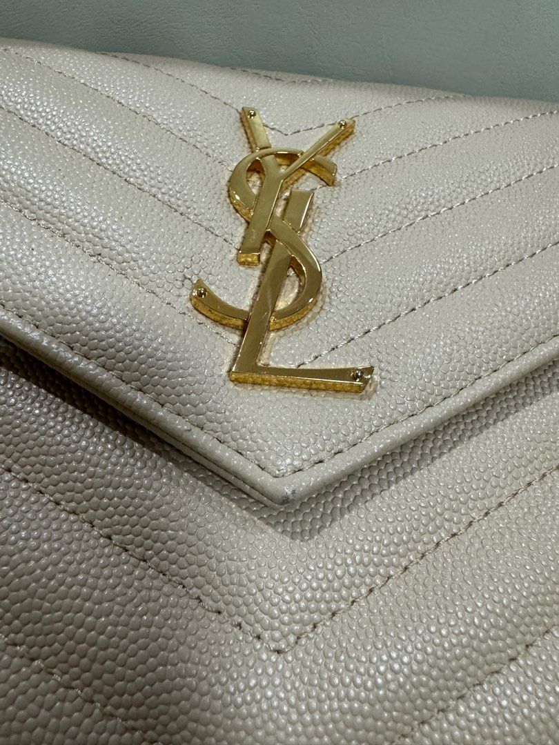 YSL wallet on chain bag (Category: Luxury Bags & Wallets) located in Manila. Submitted by yanyan2880 (Listing ID 1329463055, Image 3). Description: Barely used Negotiable just dm me for your offers Received as a gift Will try to look for the box Note the flaws as seen on the photos This was given to me lang as a gift 2 years ago. Please self authenticate with the photos provided .