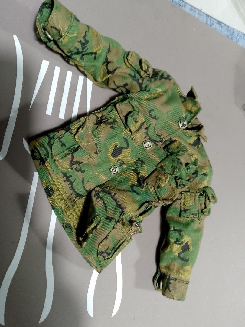 1/6 military jungle uniform (Category: Figurines & Statues) located in Taguig. Submitted by titus40k (Listing ID 1329539766, Image 2). Description: 12inch military uniform thick cotton, made in USA, 1/6 scale dolls, good condition, pick up thru grab/lalamove..