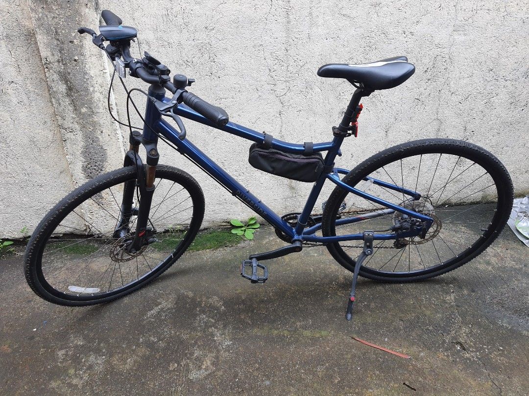 Btwin Riverside 500 Hybrid 28 (Category: Bicycles) located in Malolos. Submitted by aonf1 (Listing ID 1329509576, Image 3). Description: BTwin Riverside 500 Hybrid from Decathlon Gravel x road bike Medium frame 1x10 speed 700x38c tires Suntour front shocks Used only inside the village Mechanical disc brakes Open for swap with small or xs road bike shimano giant trek java cervèlo gt cannondale dahon brompton orbea canyon decathlon.