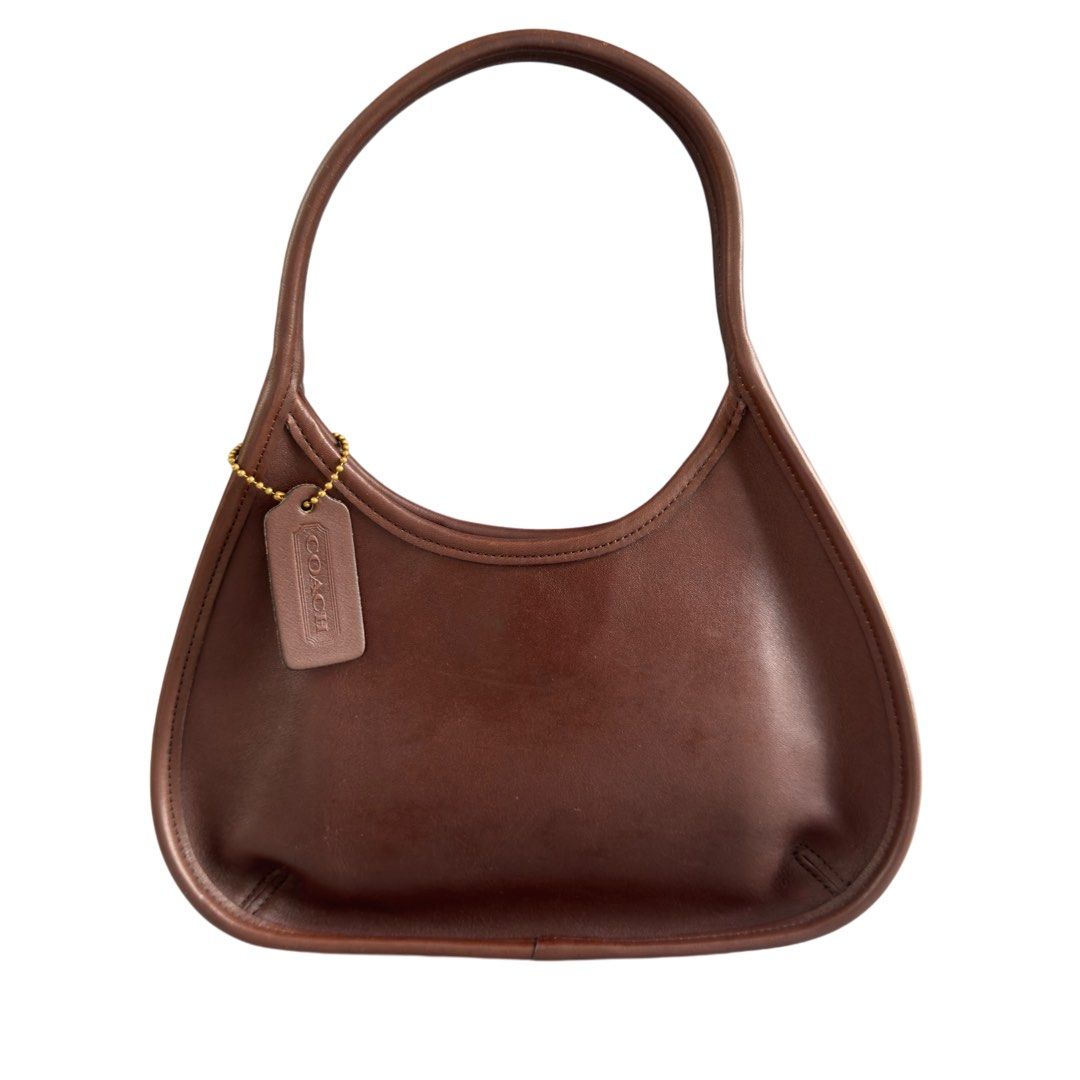 Coach Ergo 9027 (Category: Diaper Bags & Wetbags) located in Taguig. Submitted by ShopCesca (Listing ID 1329555567, Image 3). Description: The Coach Ergo 9027 is a classic hobo bag from Coach, known for its minimalist and ergonomic design. If you’re a girly who value uniqueness, then this is definitely for you! Jump on to getting this mint vintage piece while the Coach brand is just about to have its resurgence in the PH fashion scene! .