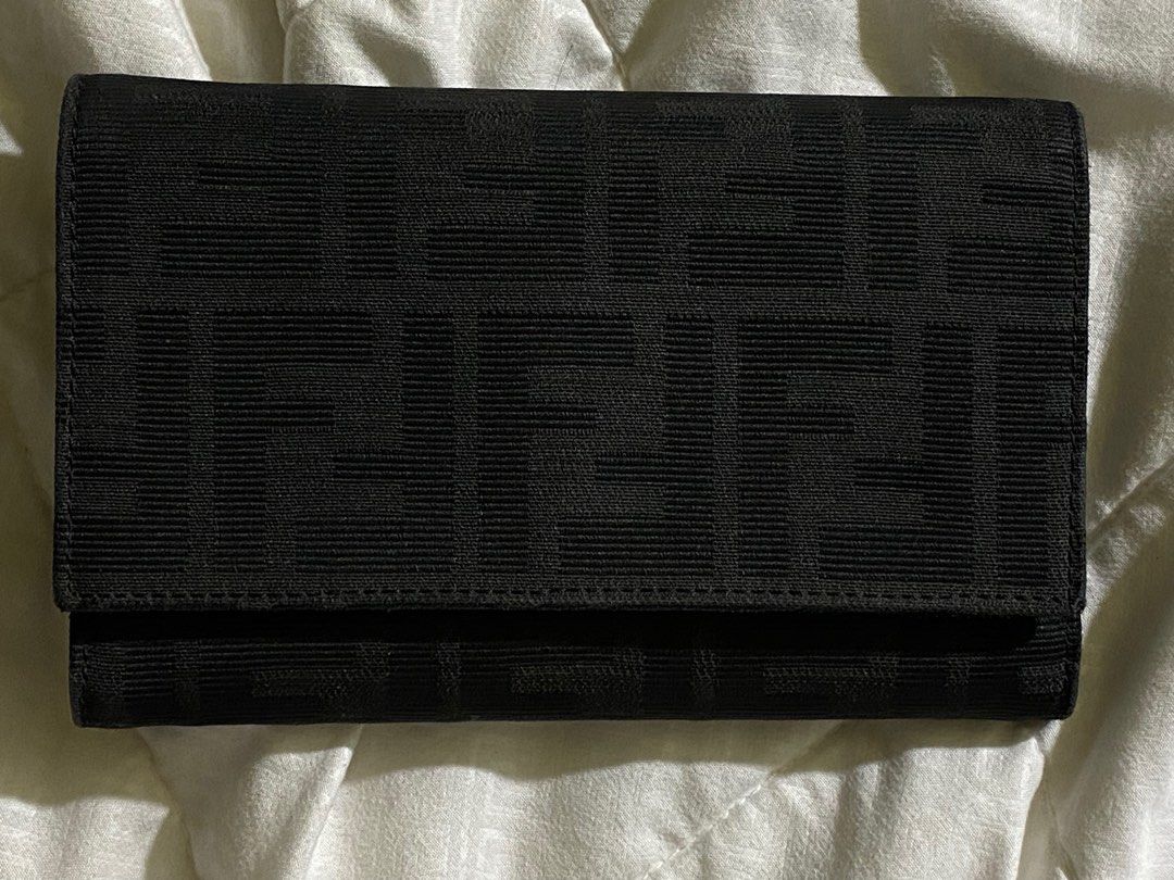 Fendi Zucca Canvas Trifold Wallet (Category: Luxury Bags & Wallets) located in Manila. Submitted by cluttercureinc. (Listing ID 1329585146, Image 1). Description: Fendi Zucca Canvas Trifold Wallet • Original • Well-used (Please see signs of usage) Price is negotiable.