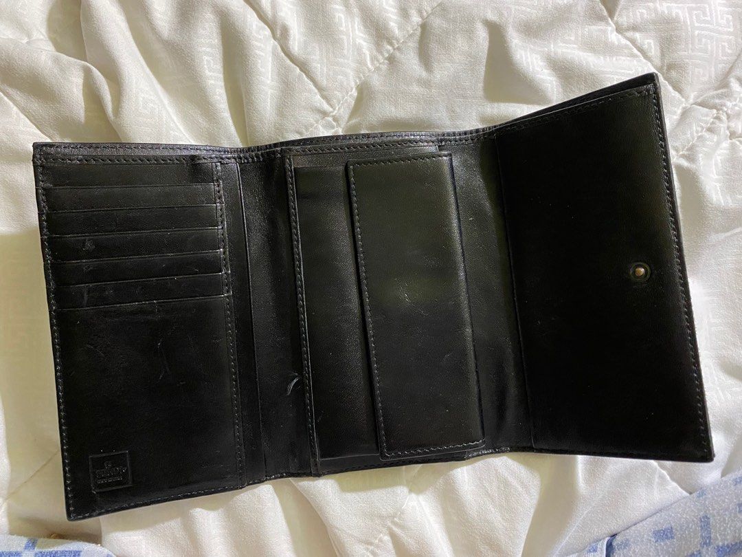Fendi Zucca Canvas Trifold Wallet (Category: Luxury Bags & Wallets) located in Manila. Submitted by cluttercureinc. (Listing ID 1329585146, Image 2). Description: Fendi Zucca Canvas Trifold Wallet • Original • Well-used (Please see signs of usage) Price is negotiable.