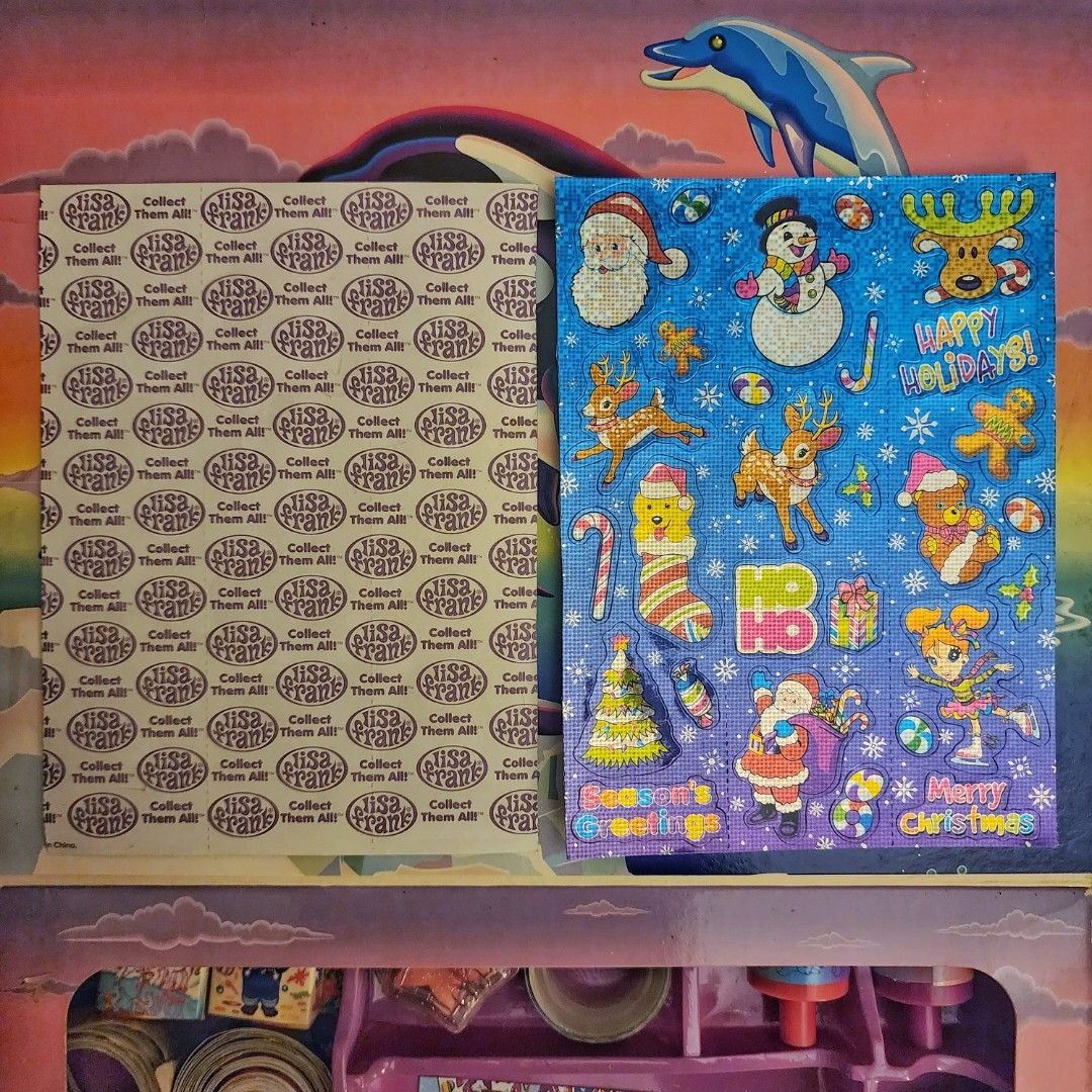 Lisa Frank Metallic Christmas Sticker Sheet (Category: Art & Prints) located in Manila. Submitted by RetroRainbowChaser (Listing ID 1329550867, Image 1). Description: 1 sheet of Lisa Frank Christmas stickers. See photo to appreciate.
