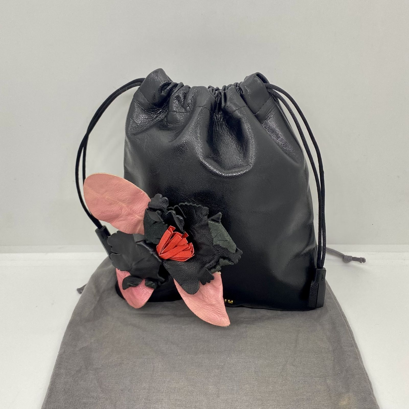 MIU MIU FLOWER DESIGN DRAWSTRING POUCH 247049424 AL Luxury Bags Wallets on Carousell