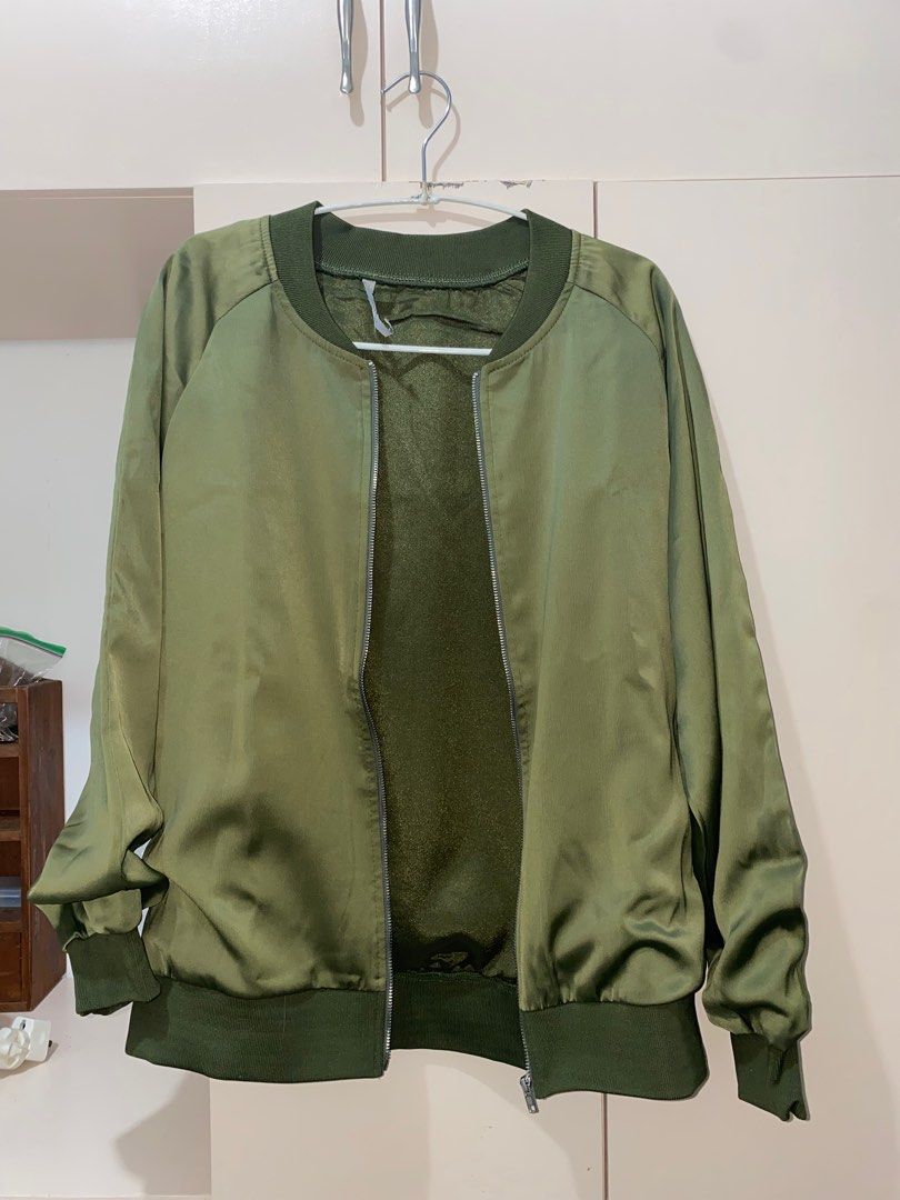 Moussy Army Green Bomber Jacket (Category: Coats, Jackets and Outerwear) located in Cavite. Submitted by a_second.chance (Listing ID 1329591181, Image 2). Description: Item details: - very good condition - silky fabric on the outside, high quality fabric lining on the inside - no discoloration - no rusting on zipper - zipper works perfectly All items are original unless stated. Prices are negotiable, just make an offer. Mode of payment: - BPI - B