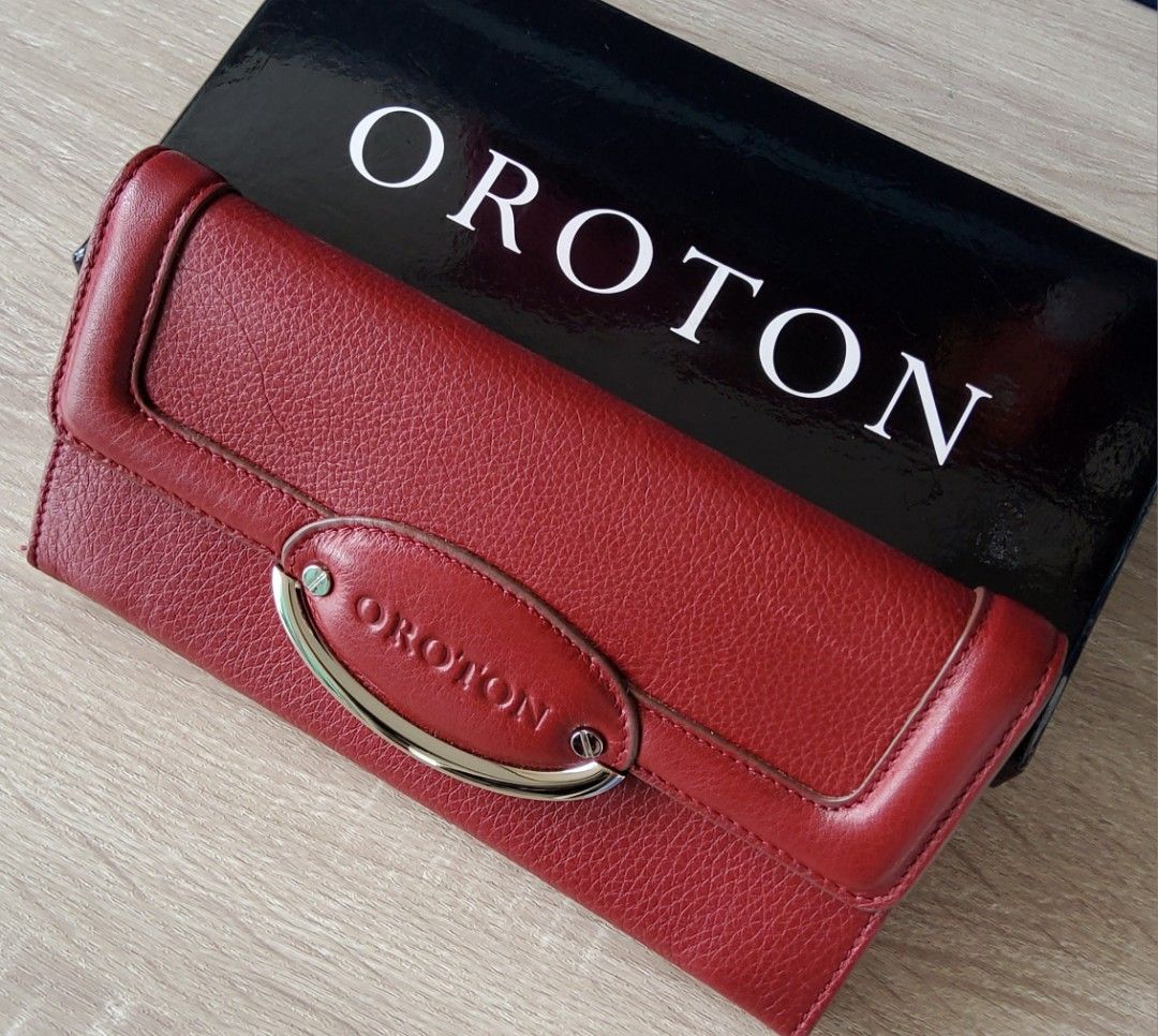 Oroton trifold wallet (Category: Luxury Bags & Wallets) located in Manila. Submitted by guziegi (Listing ID 1329521829, Image 1). Description: Red trifold wallet, luxury genuine leather. Oroton brand is from Australia..