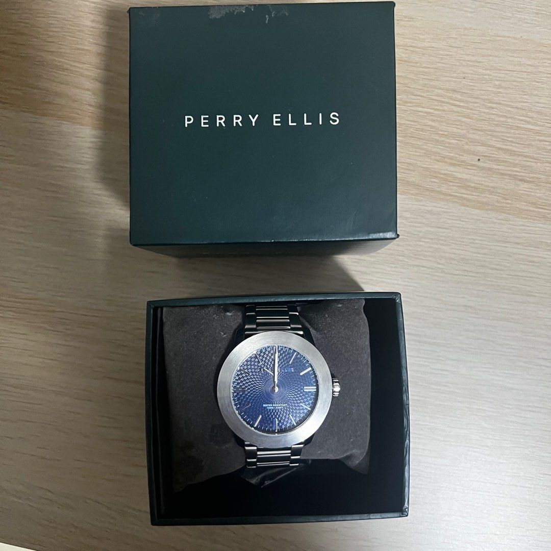 Perry Ellis Blue Dial VJ24 Quartz (46mm) (Category: Men's Watches) located in Marikina City. Submitted by declutterwithe (Listing ID 1329514345, Image 1). Description: - Selling my boyfriend’s Perry Ellis (he got this as a work anniversary gift from his previous employer - Like new (as in twice or thrice lang nasuot) - 46mm - Slimline (Stainless Steel) - Blue Dial VJ24 Quartz - With box and card - 100% authentic.