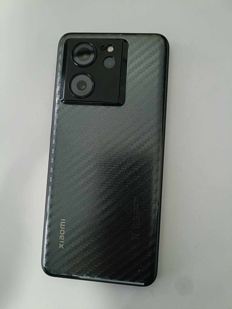 Xiaomi 13T (4 mos. old with receipt) (Category: Xiaomi) located in Manila. Submitted by pipenjames (Listing ID 1329565078, Image 2). Description: Sale or swap sa ka-value na Google Pixel/iOS/ROG PASS SA ADD AKO. Xiaomi 13T 4 months old with receipt 12/256 NTC Variant With original box, cases, TG, 67w type c to type c charger (full charge in 36 mins), lens protector, carbon back cover. Quick specs: Dimensity 8200 Ultra Stable 90fps in CODM Stable 