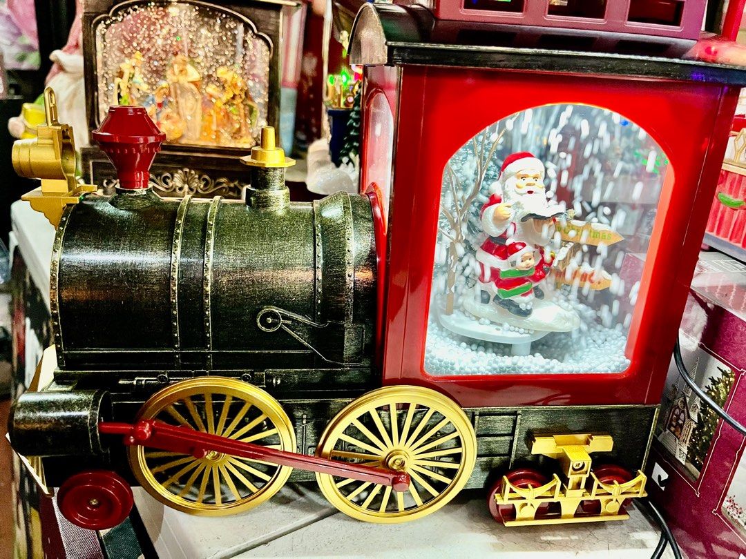 Repriced! Christmas Train Santa Snowglobe (Category: Vintage Collectibles) located in Quezon City. Submitted by thequaintshop (Listing ID 1329688525, Image 1). Description: 12 x 6 x 10” inches With lights and sounds .