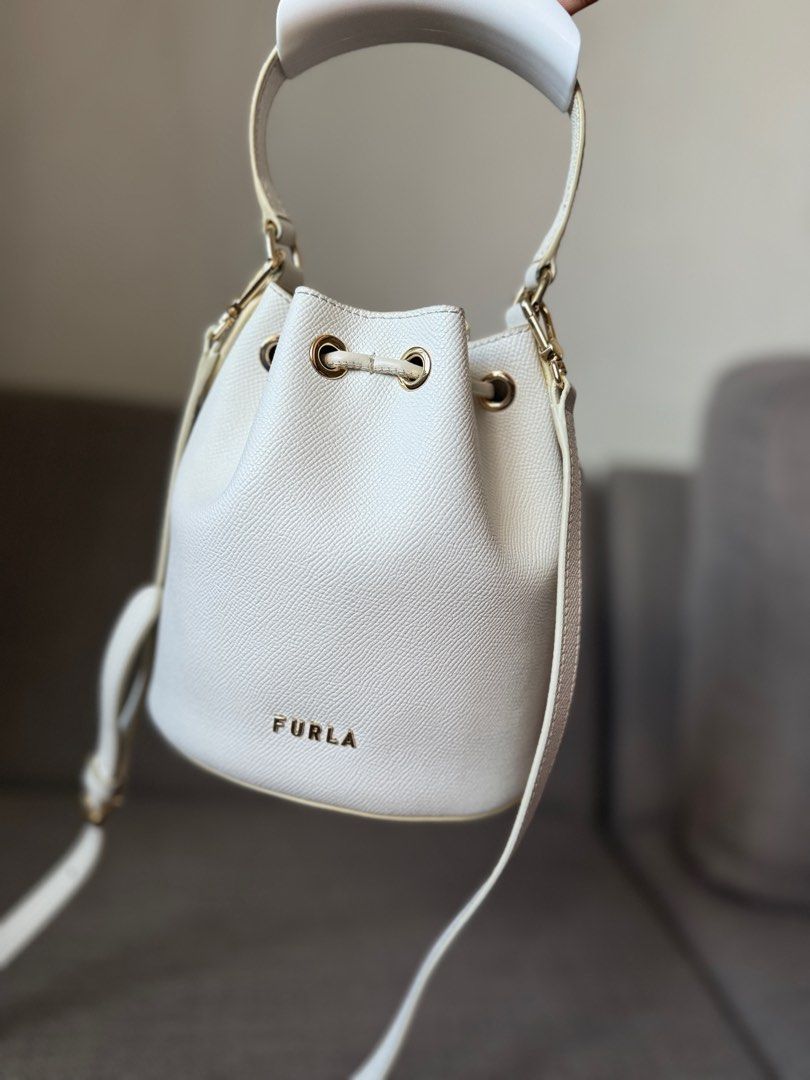 Furla Bucket (Category: Luxury Bags & Wallets) located in Quezon City. Submitted by charmenella (Listing ID 1329728444, Image 3). Description: Bought this for 10999 from IG shop all the way from US. Just need some clean up and used twice only for an event Get 2 bags from my shop with freebies RFS: need money for my small business.