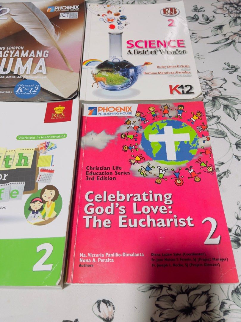 Grade 2 Private School Books (2 sets available) (Category: Textbooks) located in Baguio. Submitted by claudnibela (Listing ID 1329775786, Image 2). Description: - Grade 2 - Set 1: Celebrating God's Love: The Eucharist Learning and Intensifying English Today Pinagyamang Pluma Science A Field of Wonder Math for Life Bagong Lakbay ng Lahing Pilipino - Grade 2 - Set 2: Celebrating God's Love: The Eucharist Learning and Intensifying English Today Pina
