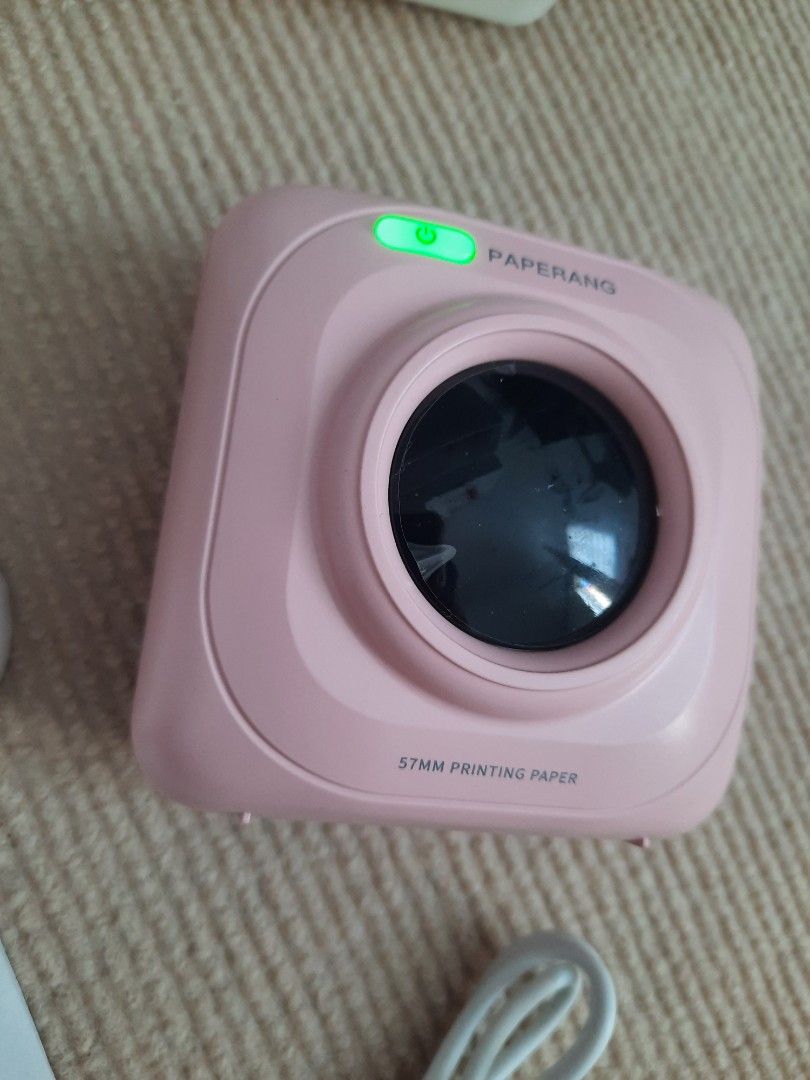 WITH MORE FREEBIES! PAPERANG | INSTANT PRINTER | PINK| THERMAL PRINTER | HANDY (Category: Printers, Scanners & Copiers) located in Cavite. Submitted by jam90053 (Listing ID 1329720216, Image 3). Description: Brand new! Gamitin sana sa small business but di natuloy! No damage! 💯 With free 3 Thermal Paper and more freebies! RFS: Need funds 🙏.