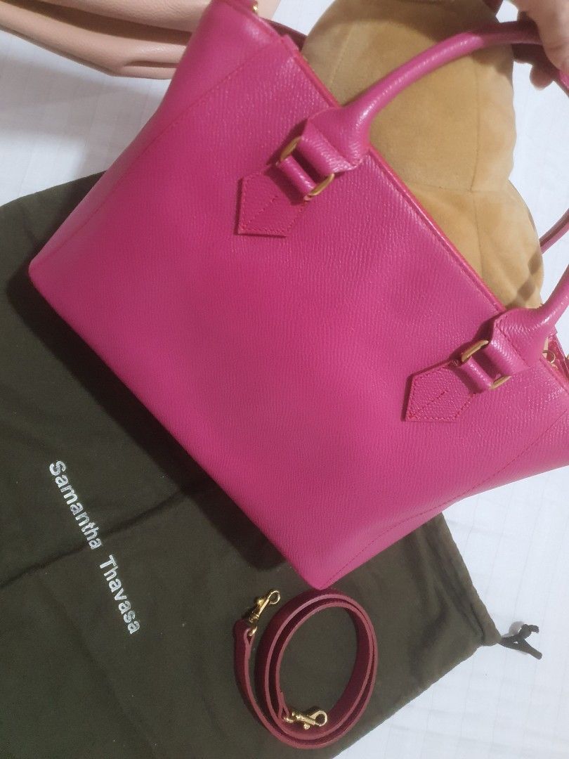 Pink Samantha thavasa tote bag (Category: Luxury Bags & Wallets) located in Iloilo. Submitted by bricknoir (Listing ID 1329670432, Image 2). Description: please scrutinize pics carefully. signs of wear at the bottom four corners otherwise bag is in excellent condition penmark inside the bag tried removing it comes with strap for shoulder wear about 13 inches across. leather is thin amd lightweight.