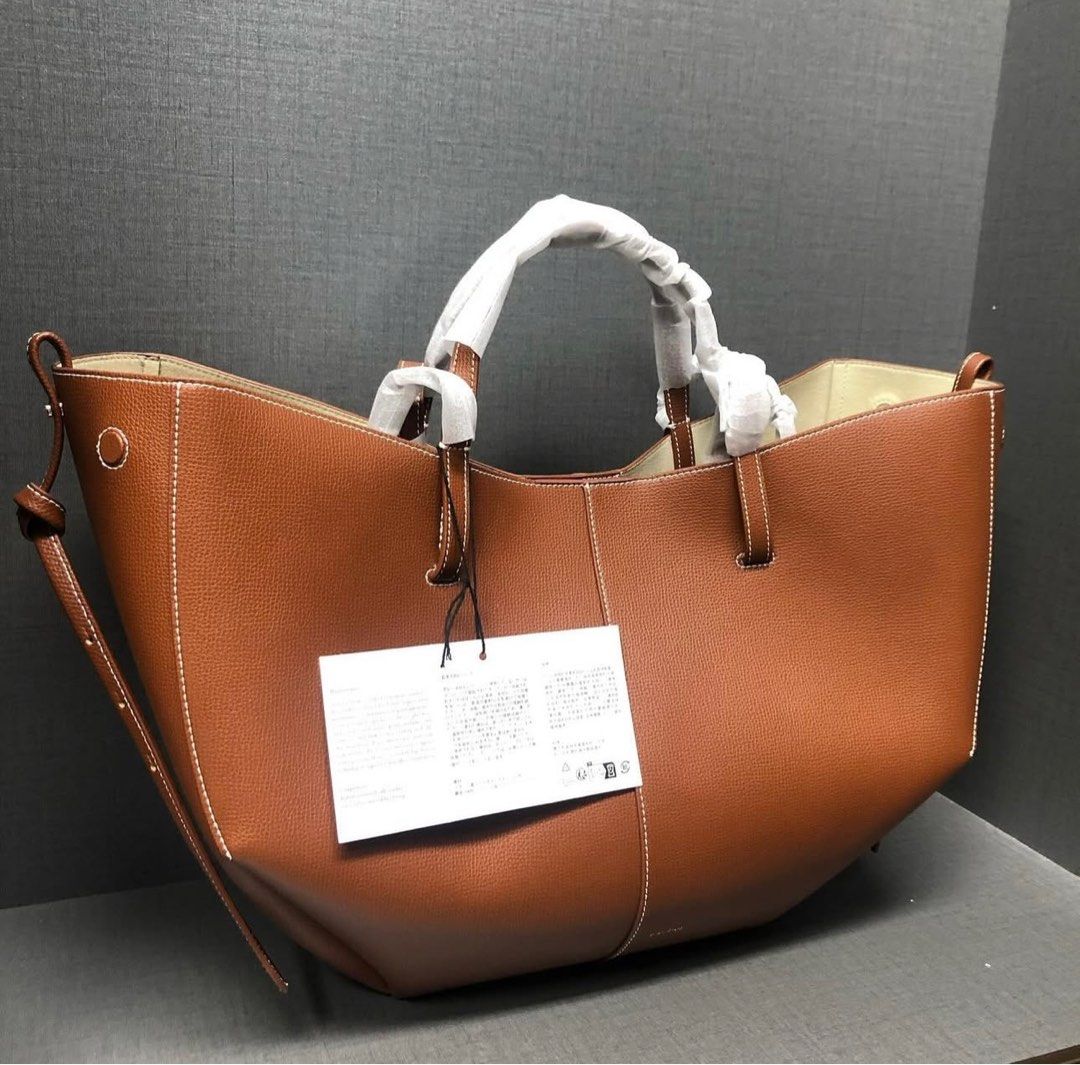 Polene Cyme Bag Mini Regular (Category: Luxury Bags & Wallets) located in Quezon City. Submitted by t.clo__ (Listing ID 1329793825, Image 1). Description: Black, Camel, Cognac, taupe Pre-order Comes with dust bag only.