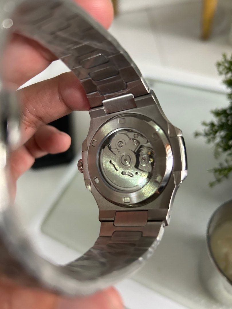 Seiko Mod Naut Tiffany (Category: Luxury Watches) located in Las Pinas. Submitted by bbmono (Listing ID 1329674007, Image 2). Description: Seiko Naut Mod Tiffany Nh35 movement Transparent bottom Nautilus Homage 904l Steel Complete Links Brand new Las Pinas area PM ME.