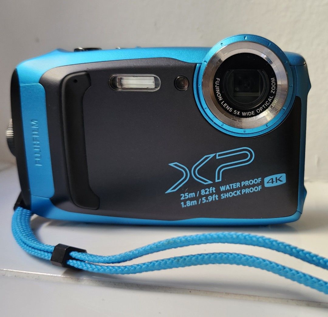 Fujifilm finepix xp140 waterproof camera and protective carry case like new! (Category: Photography) located in Mississauga. Submitted by saundersm74698 (Listing ID 1329993996, Image 1). Description: This is a great little camera that has never disappointed me at all, but it has been barely used so still in amazing condition. Has one battery which is rechargeable through a USB mini (not included) and can connect to a monitor/tv via a hdmi port (s