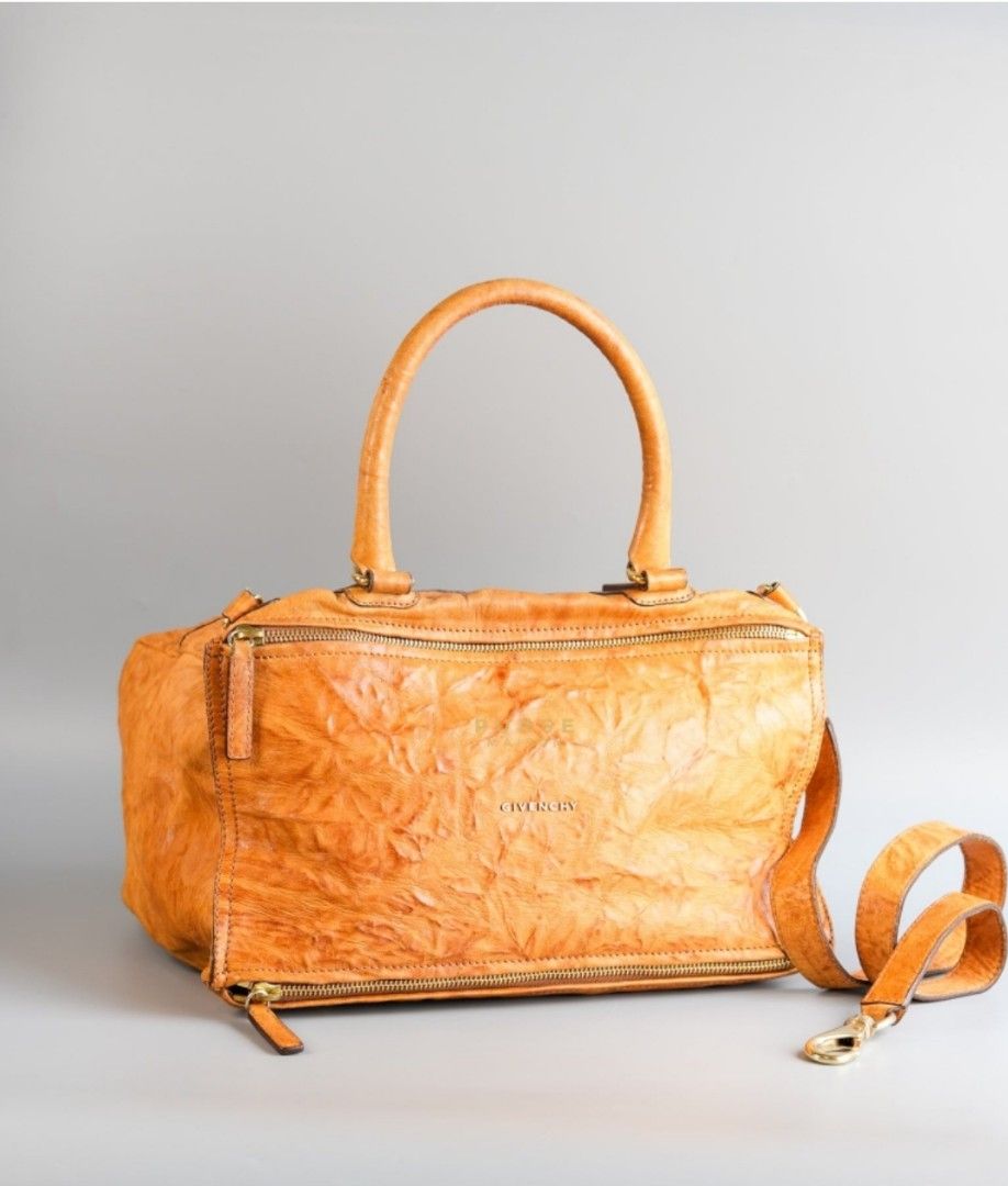 Givenchy Large Pandora Brown Bag in Sheep Leather (Category: Luxury Bags & Wallets) located in Taguig. Submitted by pursemaison (Listing ID 1329871461, Image 1). Description: Givenchy Large Pandora Brown Bag in Sheep Leather ✨Php 35,500 *Additional 3.85% for straight credit card payments *Available for 3 months layaway with 1% interest per month *BDO credit card up to 36 mos & Citibank credit card up to 24 mos (with interest) CONDITION: Fair cond