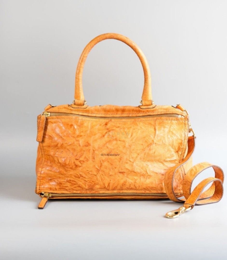 Givenchy Large Pandora Brown Bag in Sheep Leather (Category: Luxury Bags & Wallets) located in Taguig. Submitted by pursemaison (Listing ID 1329871461, Image 2). Description: Givenchy Large Pandora Brown Bag in Sheep Leather ✨Php 35,500 *Additional 3.85% for straight credit card payments *Available for 3 months layaway with 1% interest per month *BDO credit card up to 36 mos & Citibank credit card up to 24 mos (with interest) CONDITION: Fair cond