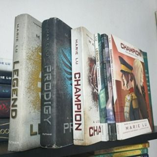 (‼️Free Shipping depending on location‼️) LEGEND TRILOGY BY MARIE LU (decluttering) (Category: Storybooks) located in Cavite. Submitted by bookbub_olx (Listing ID 1329855544, Image 2). Description: Set includes: Book 1: Legend (HB) Book 2: Prodigy (HB) Book 3: Champion (PB) Issue: slight dents and tears in Prodigy HB dust jacket RFS: decluttering.