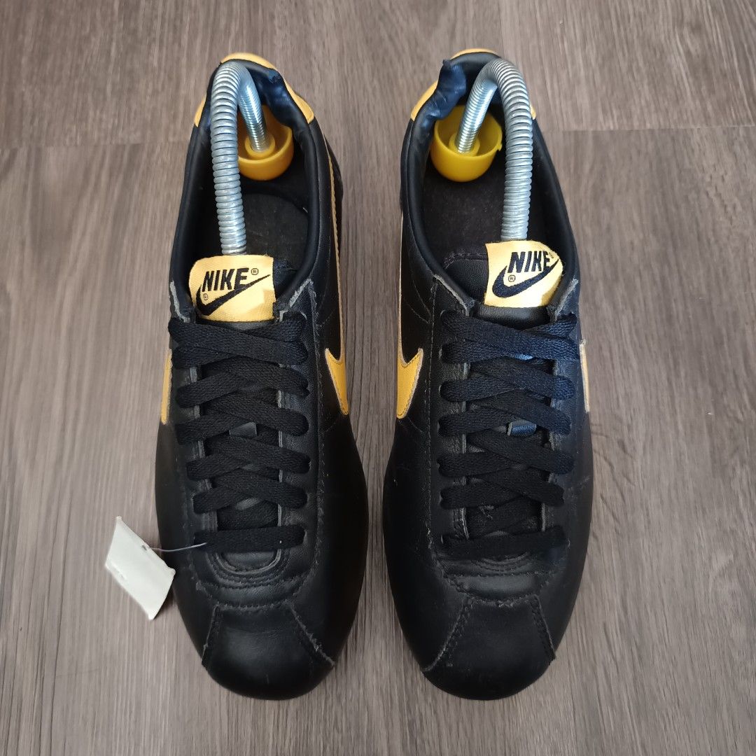 yellow and black nike cortez