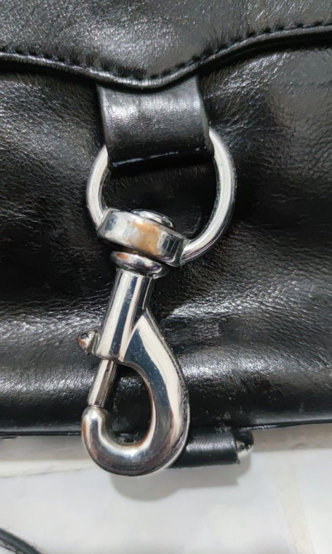Rebecca Minkoff Sling Bag Black (Category: Cross-body Bags) located in Mandaue City. Submitted by lalai4321 (Listing ID 1329889160, Image 3). Description: Slightly tarnished metal at the front as seen in pictures. Overall looks very new.